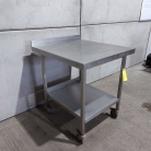 700mm Wide Solid Welded Stainless Steel Wall Table With Undershelf & On Castors