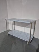 New Solid Welded 1500mm Stainless Steel Centre Table With Undershelf On Castors